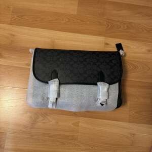 COACH® | Hitch Messenger Bag In Signature Canvas